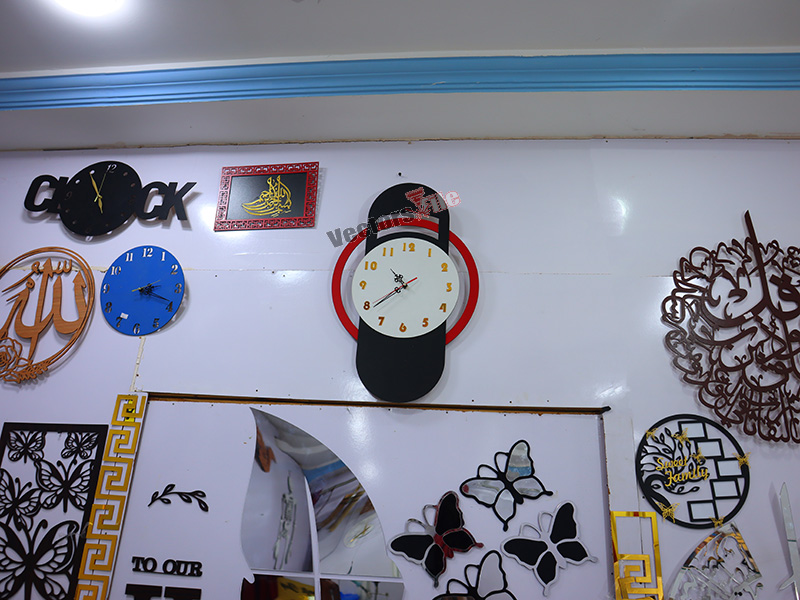 Laser Cut Modern Wall Clock with Ring Pattern Design
