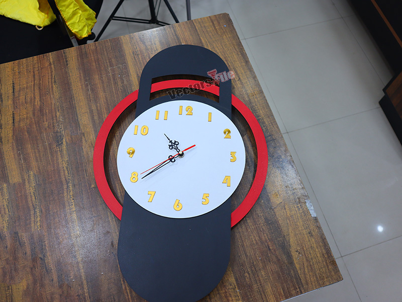 Laser Cut Modern Wall Clock with Ring Pattern Design