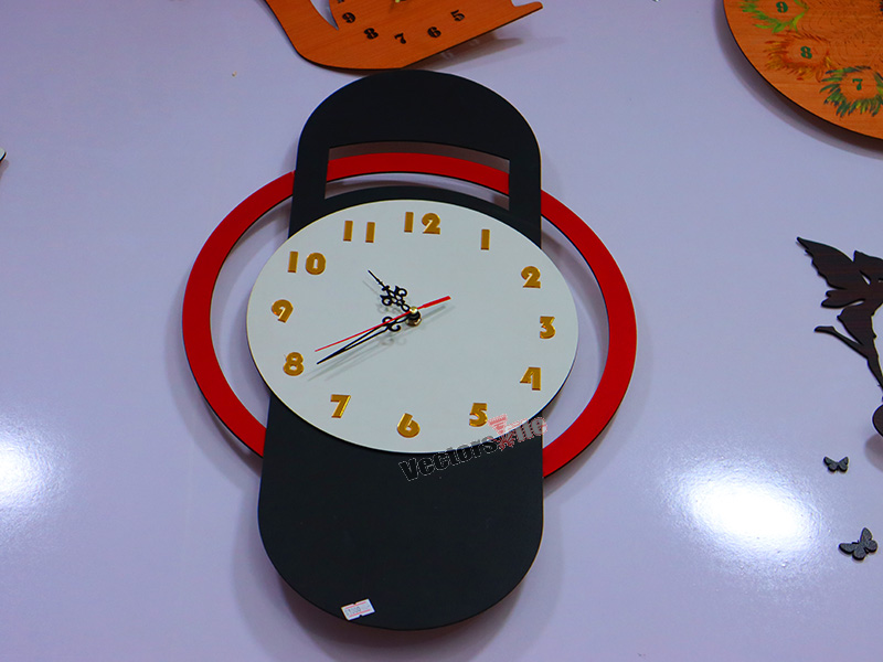 Laser Cut Modern Wall Clock with Ring Pattern Design