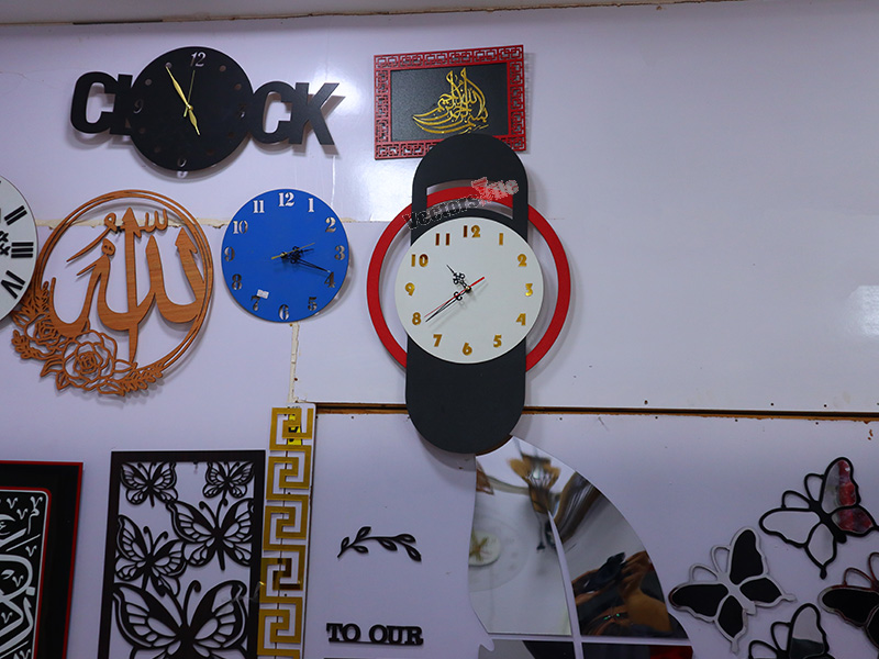 Laser Cut Modern Wall Clock with Ring Pattern Design
