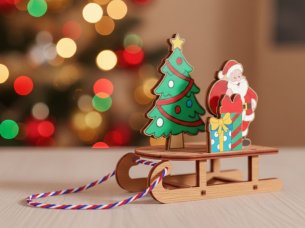 Laser Cut Christmas Decoration Sleigh with a Christmas Tree Gift and Santa Claus