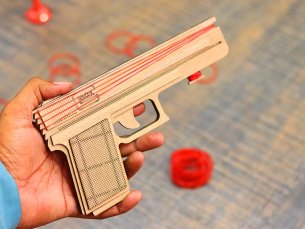 Laser Cut Rubber Band Gun Toy Model with Auto Loading Vector File